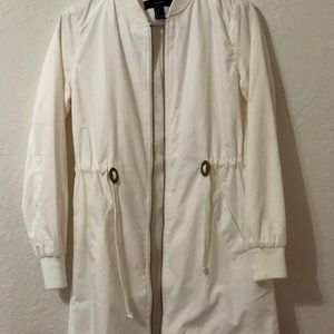 A white long coat (jacket)